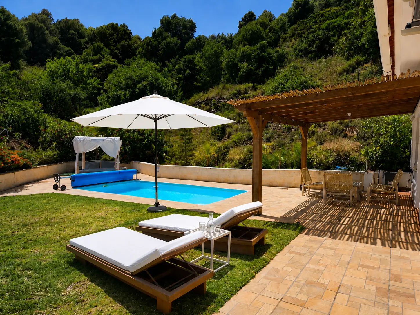 Private pool, sun loungers and shaded pergola at Casa Con Alma